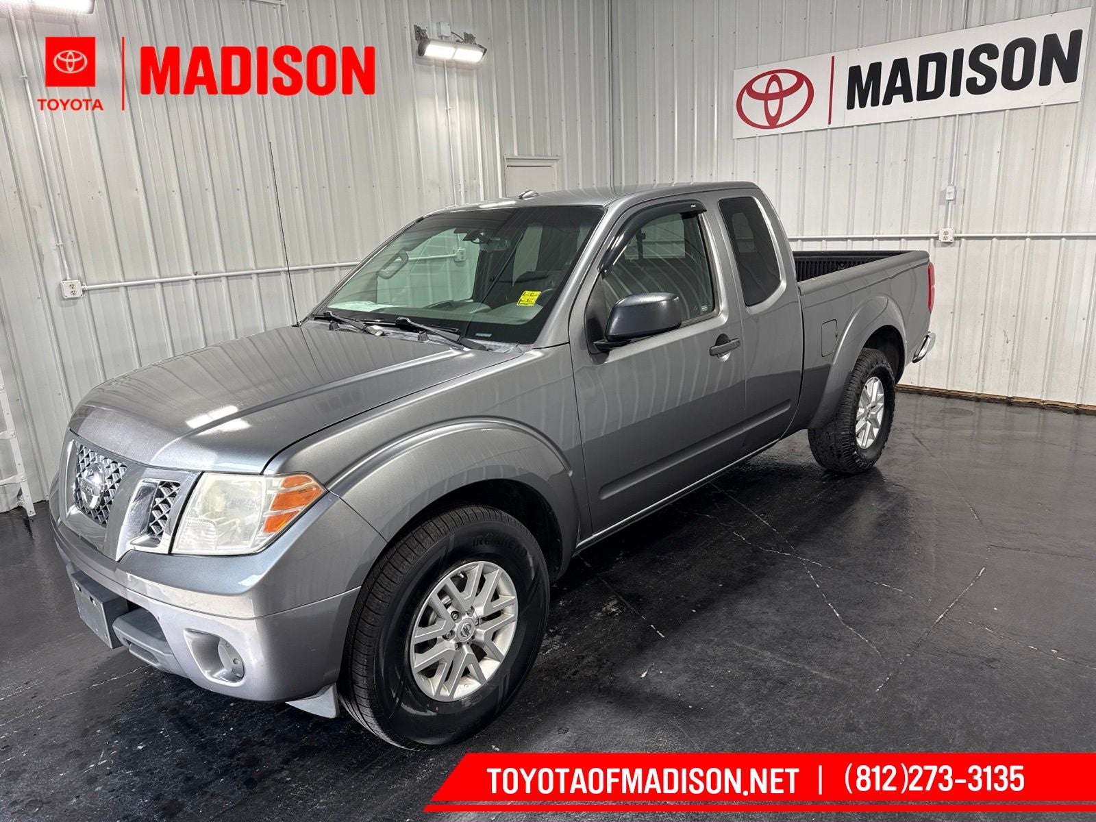 2016 Nissan Frontier SV in Gun Metallic — front three-quarter view