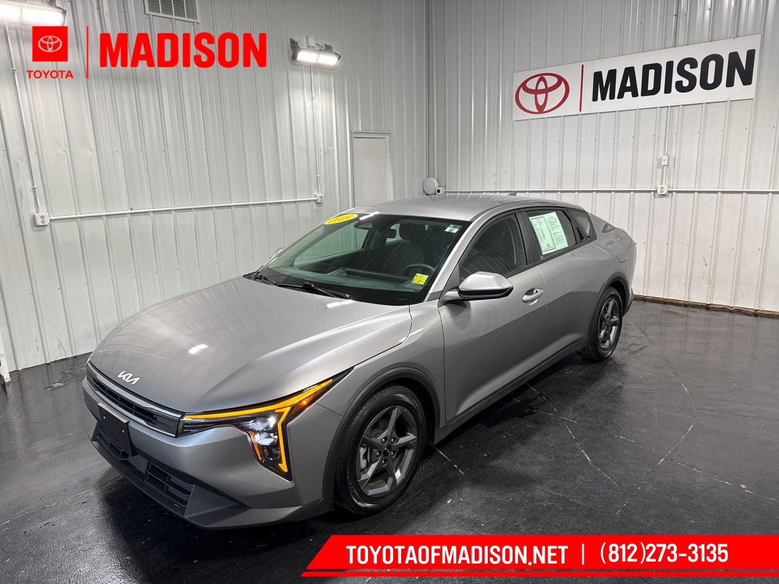 2025 Kia K4 LXS in Steel Gray — front three-quarter view